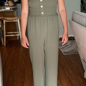 Wide leg jump suit Olive green. Size small. Smocking on top with straps.